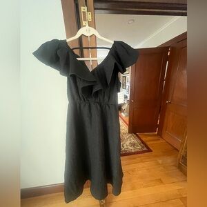 Black crepe ruffle collar dress with pockets.  Never worn !